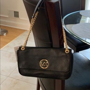 Michael kors  black leather.  Purse